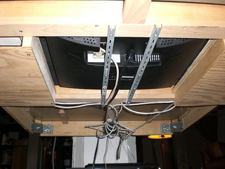 Illustration for article titled Man Fits Home-Made Gaming System to IKEA Dining Table